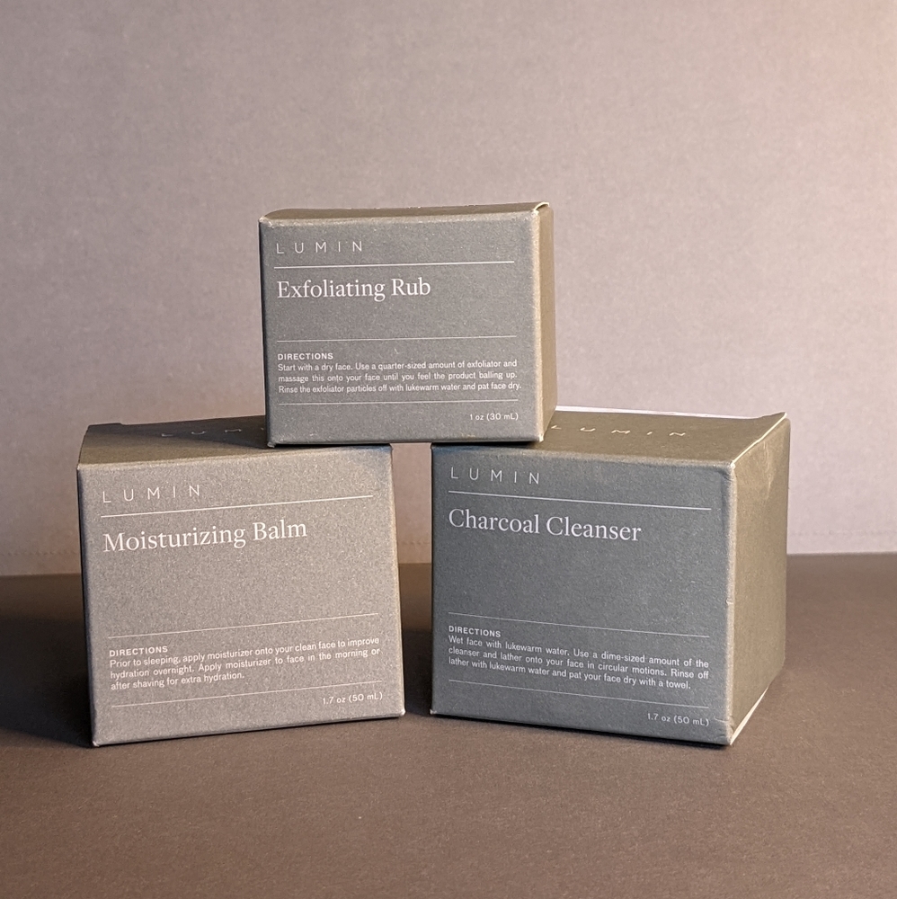 Lumin Set Moisturizing Balm, Charcoal Cleanser, and Exfoliating Rub